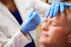 Older Man with anti-wrinkle injection